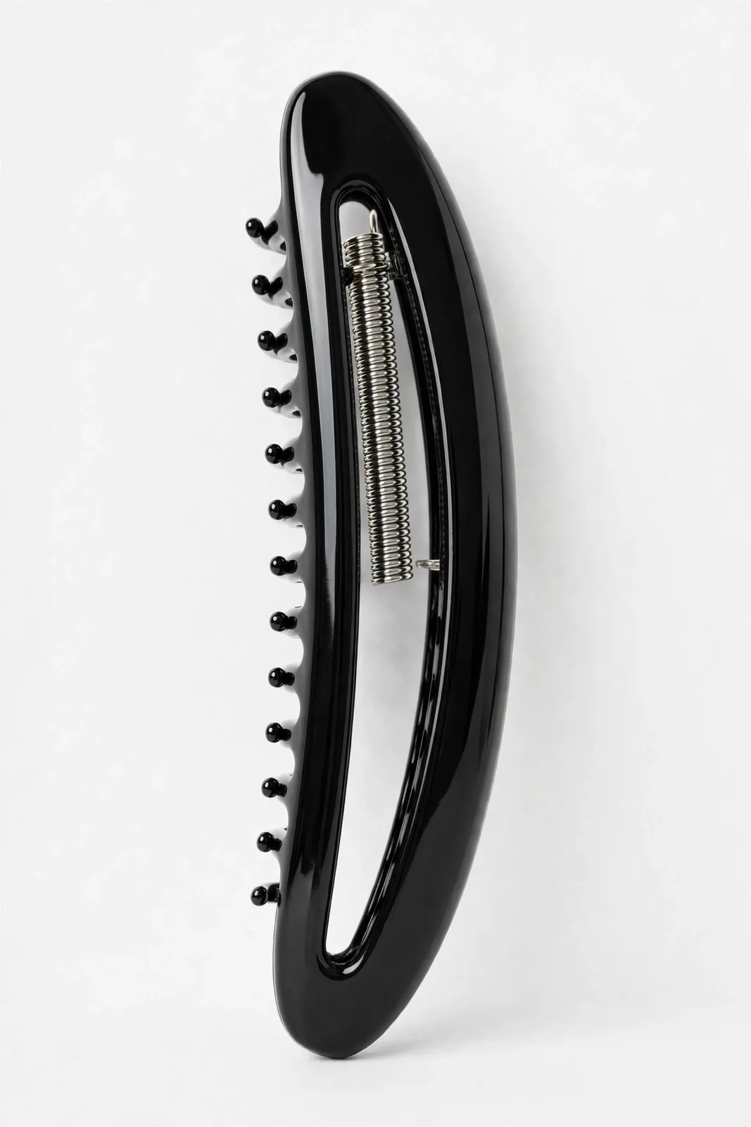 Black Banana Claw Clip, studio product photo on white background