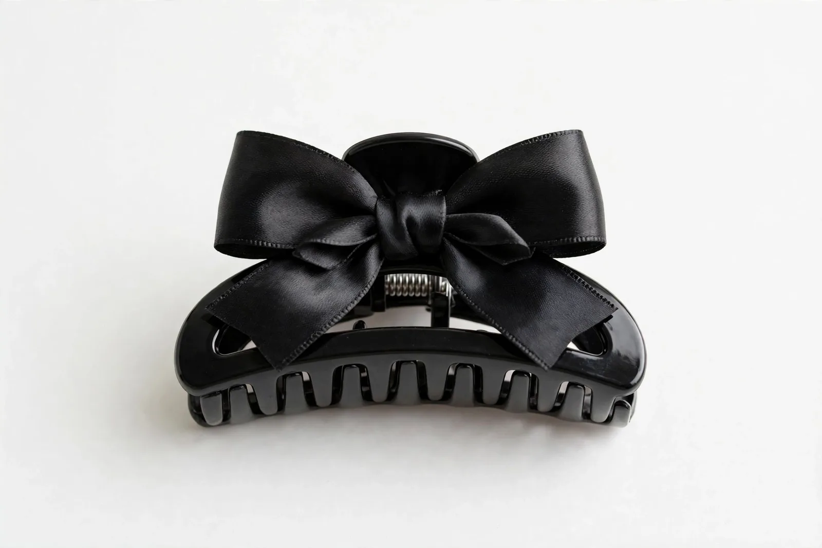 Black Bow Claw Clip, studio product photo on white background