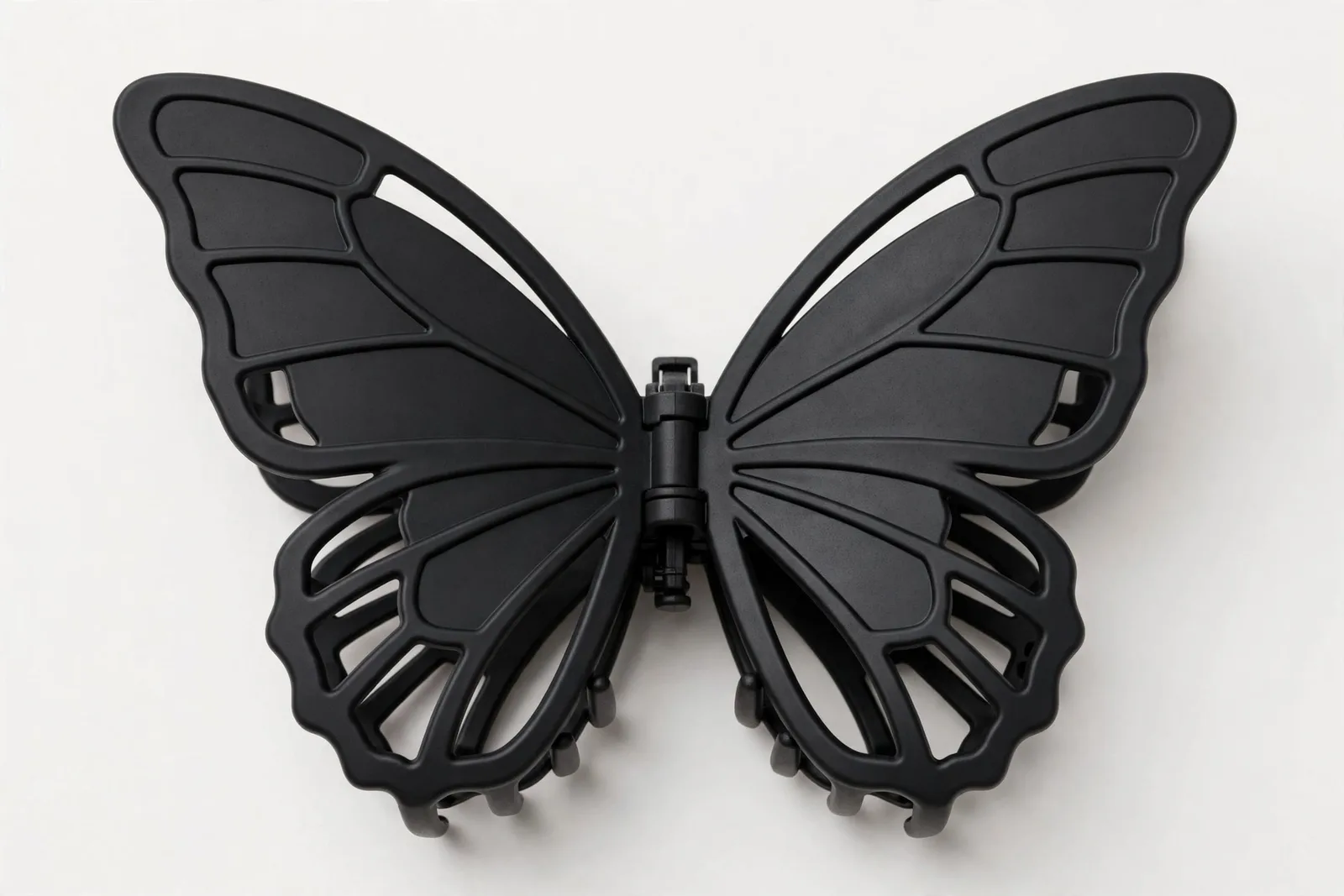 Black Butterfly Claw Clip, studio product photo on white background