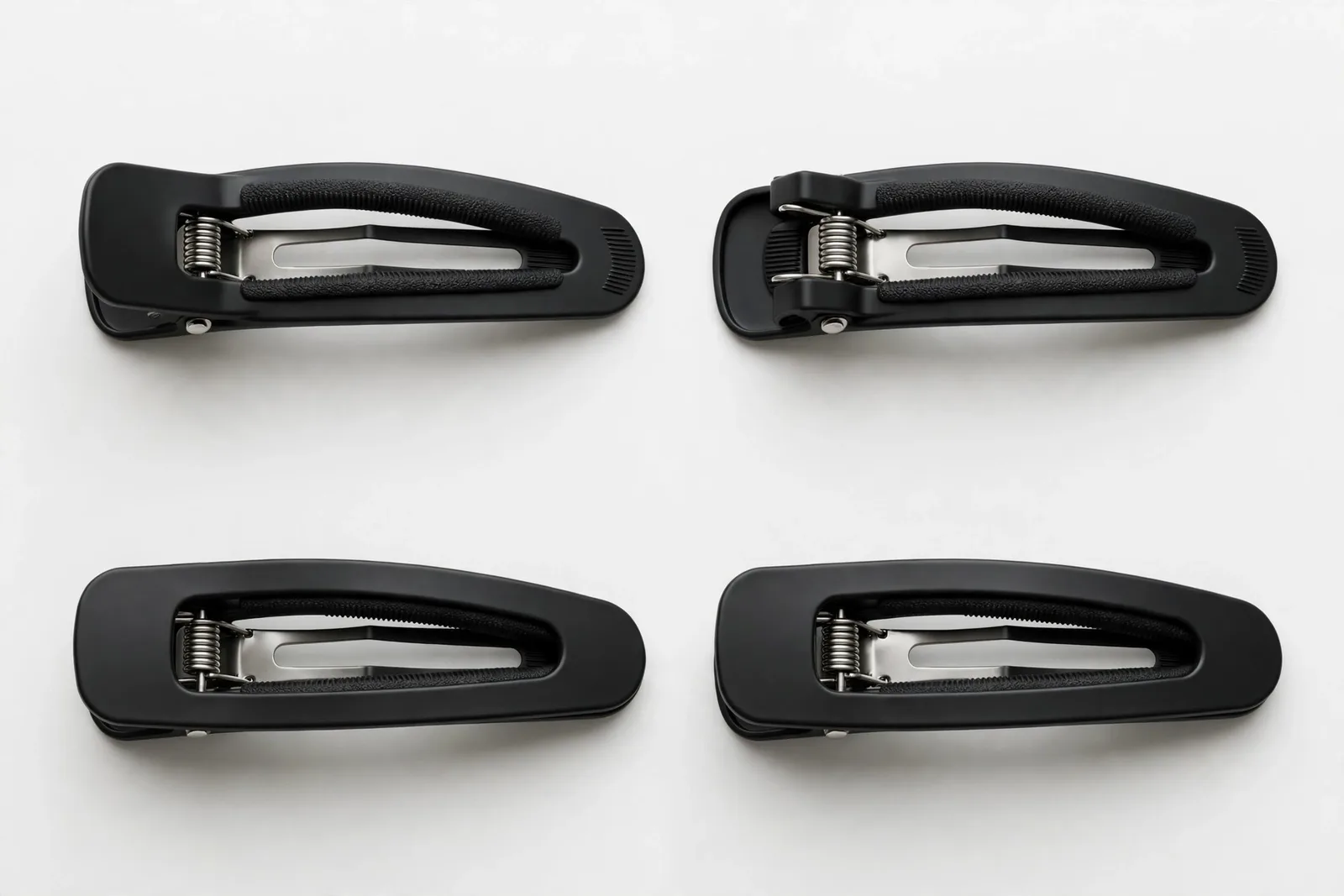 Black Large Sectioning Clips (4-Pack), studio product photo on white background