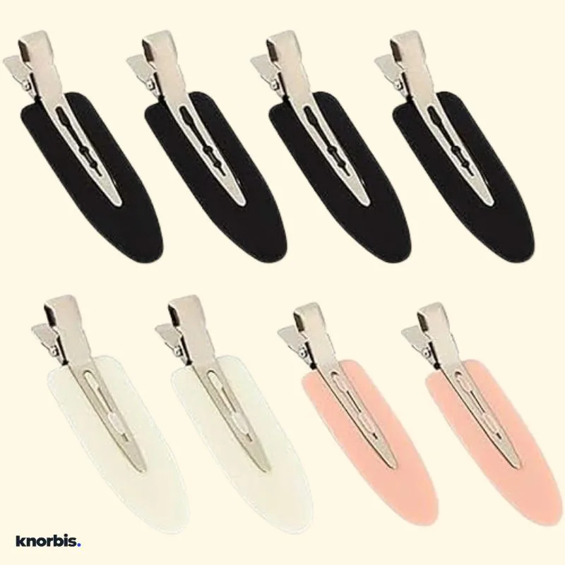 Two silver no-crease makeup hair clips side by side