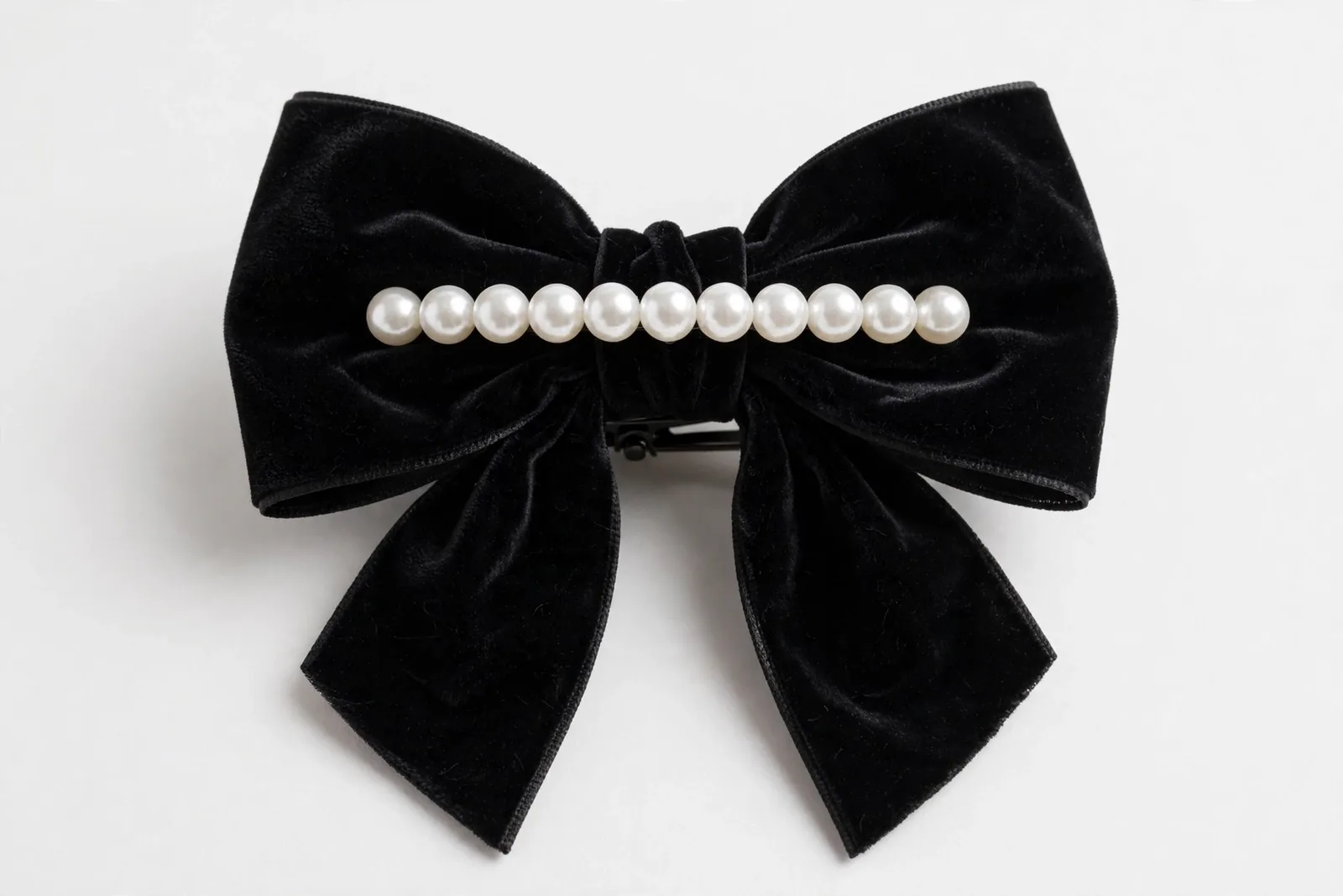 Black Pearl Bow Hair Clip, studio product photo on white background