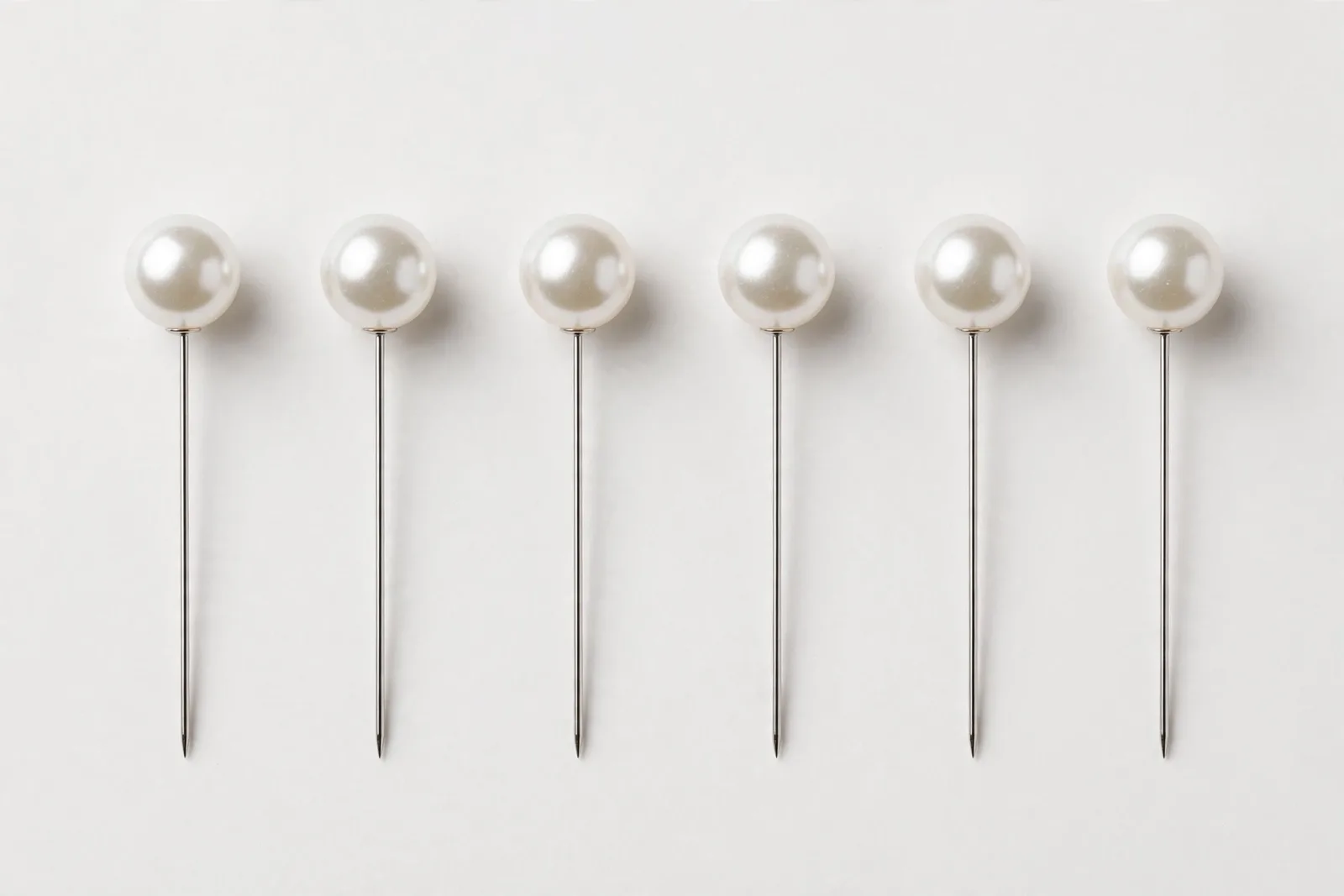 White Pearl Hijab Pins (6-Pack), studio product photo on white background