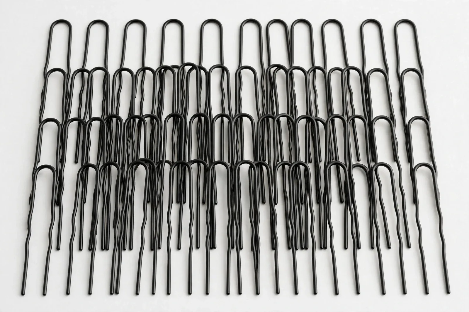 Black U-Shaped Bun Pins (50-Pack), studio product photo on white background